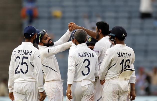 Indian cricket team captain Virat Kohli celebrates with teammates after the dismissal of Keshav Maharaj. (AP)