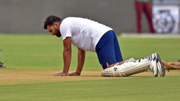 Rohit Sharma inspects the pitch during a practice session at Maharashtra Cricket Association Stadium in Pune. (Pratham Gokhale/HT Photo) Rohit Sharma inspects the pitch during a practice session at Maharashtra Cricket Association Stadium in Pune. (Pratham Gokhale/HT Photo)