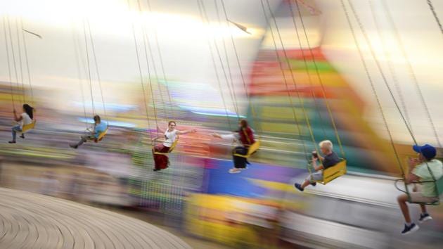 People enjoy a swing ride at an autumn fair in Titu, southern Romania. Fairs like the one in Titu, northwest of Bucharest, which is on its 187th edition, were the sole public entertainment in 19th-century rural Romania. It’s a bit more high-tech nowadays, but otherwise little has changed in two centuries. (Andreea Alexandru / AP)
