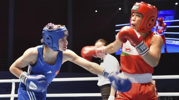 Six-time champion MC Mary Kom in action against Turkey's Busenaz Cakiroglu during the World Women's Boxing Championships in Ulan-Ude, Russia. Kom, seeded third, lost 1-4 to second seed Cakiroglu. (PTI)