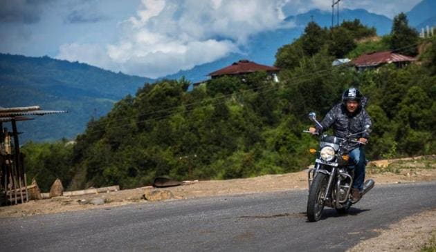 Arunachal Pradesh Chief Minister Pema Khandu during his ride from Yingkiong, the headquarters of Upper Siang district, to Pasighat, the headquarters of East Siang district on Sunday.(HT PHOTO)