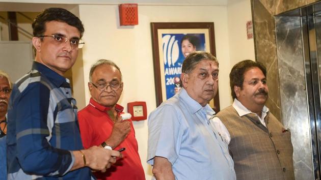 Former cricketer Sourav Ganguly along with N Srinivasan arrives at the BCCI headquarters.(PTI)