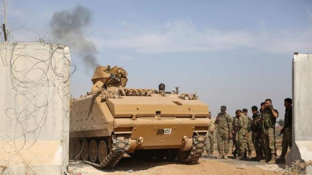 The Kurds, who recaptured swathes of northeastern Syria from Islamic State with the backing of the United States, say the Turkish assault could allow the jihadist group to re-emerge as some of its followers were escaping from prisons. Five Islamic State fighters fled a jail in Qamishli, the largest city in the Kurdish-held the day ISIS claimed responsibility for a deadly car bomb in the city which was under heavy Turkish shelling. (Nazeer Al-khatib / AFP)