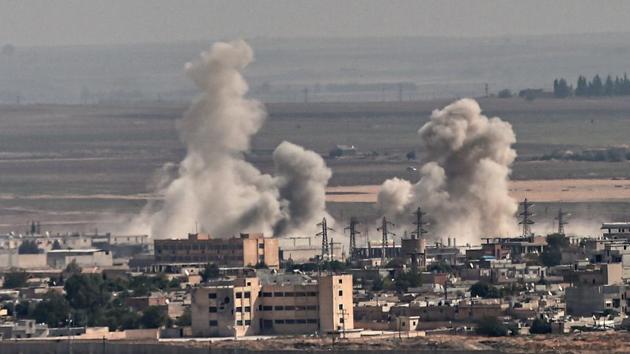 Turkey claimed control of Ras al-Ain on October 12. The Turkish defence ministry said its forces seized control of Ras al-Ain, one of the two key border towns at the focus of Ankara’s military offensive. “As part of the successful operations being conducted in the framework of Operation Peace Spring, the town of Rasulayn, located east of the Euphrates, has been brought under control,” the ministry said in a post on Twitter. (Ozan Kose / AFP)