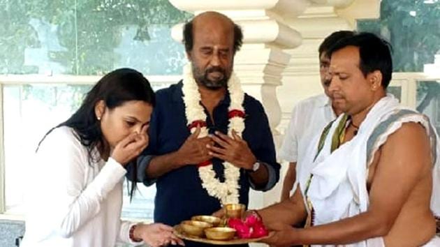 Actor Rajnikanth along with his daughter Aishwarya R Dahnush at Swami Dayanand Saraswati ashram at Rishikesh prior to leaving for Badrinath-Kedarnath pilgirmage in Garhwal Himalayas. (HT Photo) Actor Rajnikanth along with his daughter Aishwarya R Dahnush at Swami Dayanand Saraswati ashram at Rishikesh prior to leaving for Badrinath-Kedarnath pilgirmage in Garhwal Himalayas. (HT Photo)