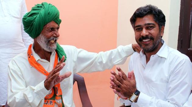 BJP candidate Aditya Devi Lal during his campaign at Masitan village in Dabwali . (Sanjeev Kumar/HT Photo) BJP candidate Aditya Devi Lal during his campaign at Masitan village in Dabwali . (Sanjeev Kumar/HT Photo)