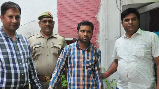 The suspect in police custody. (Sakib Ali / HT Photo) The suspect in police custody. (Sakib Ali / HT Photo)