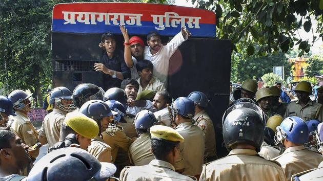 Allahabad: Police detain students of Allahabad Central University who were staging a protest demanding for students union elections, on the campus of the university in Allahabad, Tuesday(PTI)