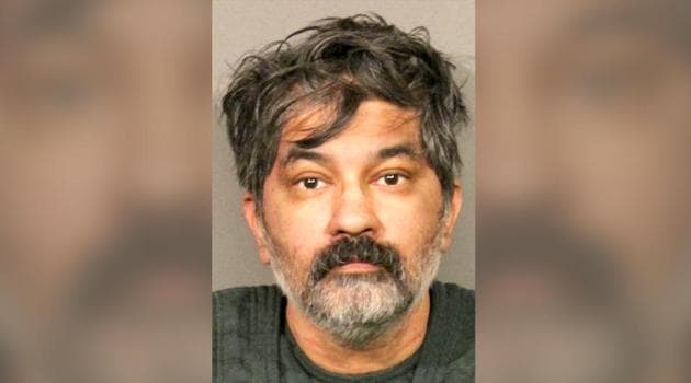 Shankar Hangud, who has been identified as the suspect, showed up at a police station with a dead body in his car and confessed to killing that person and another three members of a family. (AP photo) Shankar Hangud, who has been identified as the suspect, showed up at a police station with a dead body in his car and confessed to killing that person and another three members of a family. (AP photo)