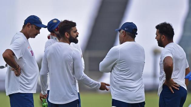 File image of India skipper Virat Kohli speaking to support staff during a practice session. (Pratham Gokhale/HT Photo) File image of India skipper Virat Kohli speaking to support staff during a practice session. (Pratham Gokhale/HT Photo)