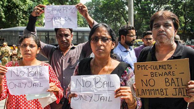 PMC bank depositors protest outside Killa Court, in Mumbai, Wednesday, Oct. 9, 2019. (PTI) PMC bank depositors protest outside Killa Court, in Mumbai, Wednesday, Oct. 9, 2019. (PTI)