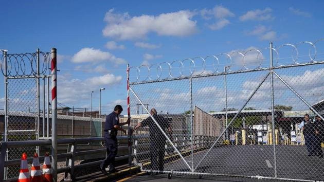 U.S. Customs and Border Protection agents close down a gate near US-Mexico border.(REUTERS)