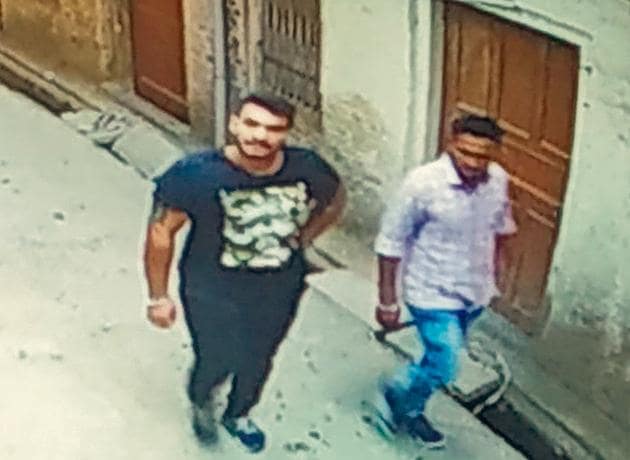 A CCTV grab showing the accused leaving the locality after the incident in Kumbra village on Friday morning.(HT PHOTO) A CCTV grab showing the accused leaving the locality after the incident in Kumbra village on Friday morning.(HT PHOTO)