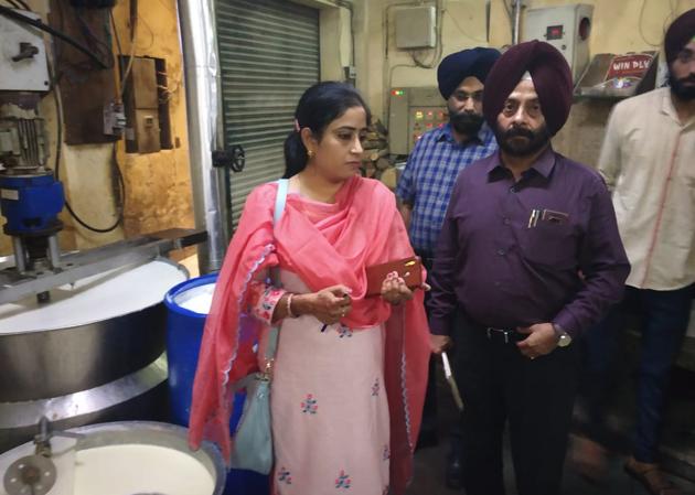 Health officials conducting a check at a commercial unit in Patiala on Friday. (HT PHOTO)