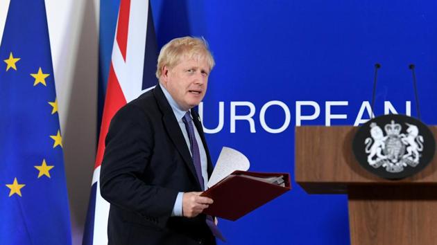 Britain's Prime Minister Boris Johnson arrives to speak at a news conference during the European Union leaders summit dominated by Brexit, in Brussels, Belgium.(REUTERS)