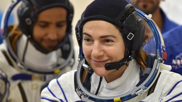 (International Space Station (ISS) crew member Jessica Meir smiles during a testing of her space suits before boarding a Soyuz rocket to the ISS at the Russian-leased Baikonur cosmodrome in Kazakhstan, on September 25. Meir, a marine biologist who arrived at the orbiting lab last month, will be the 15th female spacewalker. NASA planned the first all-female spacewalk in March, but had to call it off because an infamous spacesuit flub earlier this year that resulted in accusations of sexism. (Vyacheslav Oseledko / AFP)