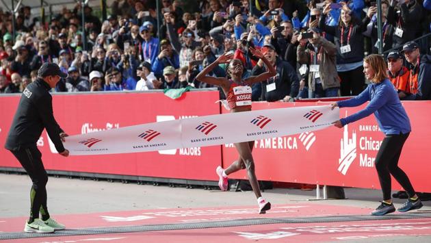 Kenya’s Brigid Kosgei crosses the finish line as she wins the women’s 2019 Bank of America Chicago Marathon with the World Record in Chicago, Illinois. Kosgei shattered Paula Radcliffe’s 16-year-old world record, winning the Chicago Marathon in 2 hours, 14 minutes and 4 seconds. Kosgei broke the mark of 2:15:25 set by Radcliffe in the London Marathon on April 13, 2003. (Kamil Krzaczynski / AFP)
