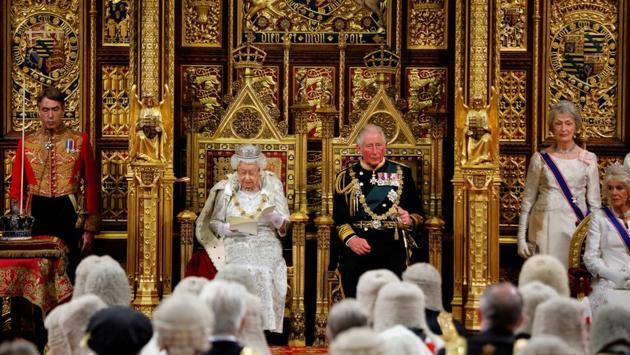 Britain’s Queen Elizabeth delivers the Queen’s Speech during the State Opening of Parliament, next to Charles, Prince of Wales in the House of Lords at the Palace of Westminster in London, England. (Tolga Akmen / REUTERS)