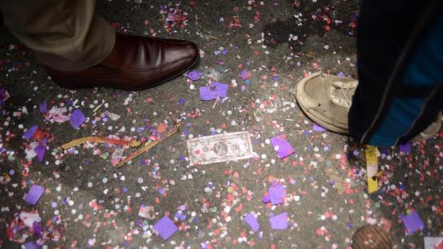 Miniature dollar bills and confetti lie on the floor during preste celebrations. The bills originate from the traditional ‘Alasita’ celebration where miniatures are used to represent items people desire. Morales, widely known simply as “Evo,” has helped lift many out of poverty since he came to office, and even changed the country’s name to the Plurinational State of Bolivia to honour its diverse ethnic groups long treated as second-class citizens. (Manuel Seoane / REUTERS)