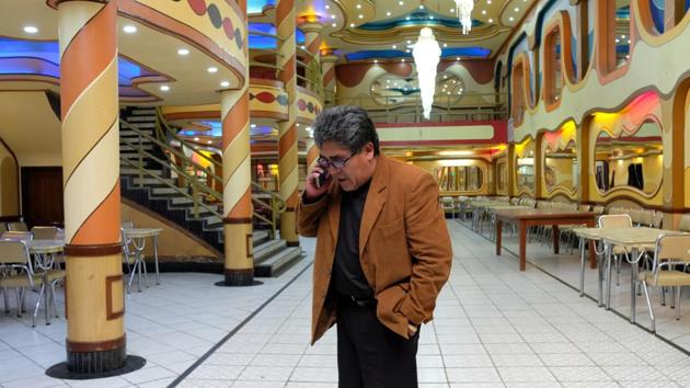 President of Salon Owners of the North Association Jhonny Segales, in one of his colourful cholets, in El Alto. According to Segales, the success of most Aymara people was down to hard work and not any help they got from Morales. “People here are like that, always working, gathering, saving, this is the spirit we have,” said Segales, wearing a smartly tailored brown jacket and on-and-off his phone on business calls. (Manuel Seoane / REUTERS)