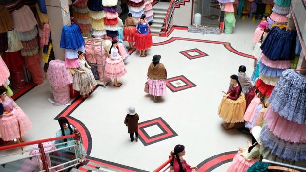 “We have gas at home, modern educational units, paved streets, football pitches, aid for children, adults and mothers, a new health care system, zero illiteracy, a fight against poverty, cable cars, and modern markets,” Marquez said. “I support the re-election of Evo Morales and (vice president) Alvaro Garcia Linera. If not them, then whom?” said Marquez. (Manuel Seoane / REUTERS)