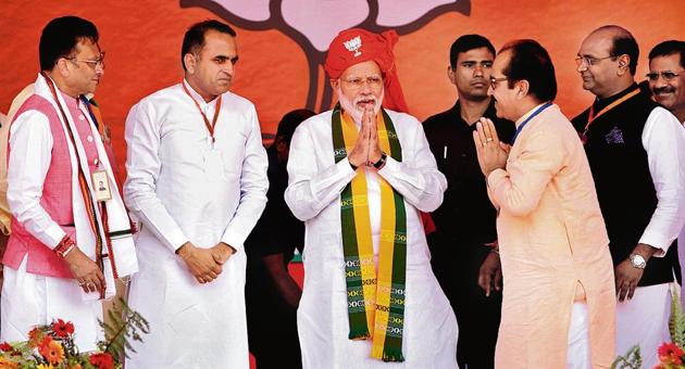 PM Narendra Modi at an election rally with BJP leaders in Ellenabad in Sirsa district. (Sanjeev Kumar/HT) PM Narendra Modi at an election rally with BJP leaders in Ellenabad in Sirsa district. (Sanjeev Kumar/HT)