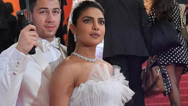 Priyanka Chopra and Nick Jonas twin in white as they arrive for the screening of the film “The Best Years of a Life (Les Plus Belles Annees D’Une Vie)” at the 72nd edition of the Cannes Film Festival in Cannes. (AP)