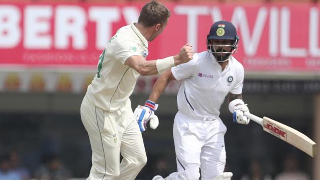 South Africa's Anrich Nortje, left, celebrates the dismissal of India's captain Virat Kohli.(AP)