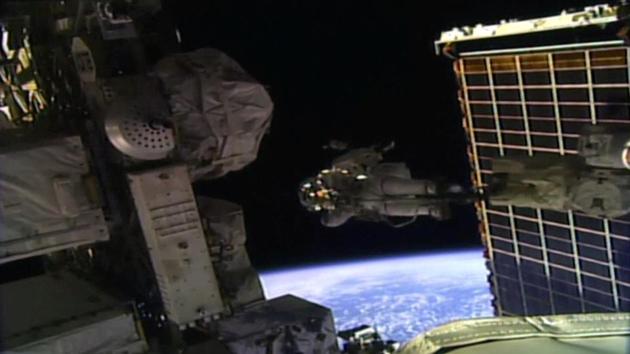 A view of NASA astronaut Jessica Meir walking outside the International Space Station (ISS). The spacewalk was originally scheduled for 5 and half hours, but both Mier and Koch successfully completed their main task and the mission was extended to more than seven hours so the astronauts could perform some additional jobs. (NASA / REUTERS)