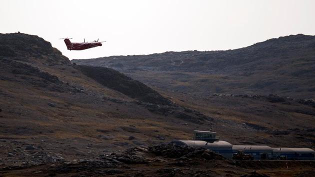 An aircraft of Air Greenland departs from Kulusuk. Arrivals to the island grew 10 percent year-on-year from 2014 to 2017, and three percent in 2018, according to the tourist board, Visit Greenland. Many adventure seekers and nature lovers arrive by plane, but cruise ships also bring admirers, hugging the picture perfect coastline. (Jonathan Nackstrand / AFP)