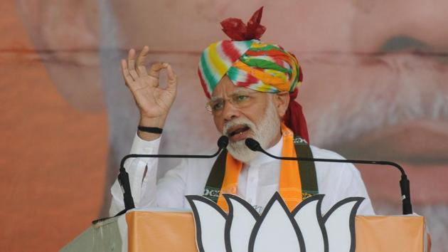 Prime Minister Narendra Modi at a rally on the last day of campaigning for assembly elections in Gurugram on Saturday. (Parveen Kumar/HT Photo) Prime Minister Narendra Modi at a rally on the last day of campaigning for assembly elections in Gurugram on Saturday. (Parveen Kumar/HT Photo)