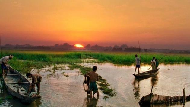 Spread over 1,256 sq km at the beginning of the 20th century, Majuli island has now been reduced to around 350 sq km uprooting many of its residents in the process.(HT PHOTO.)