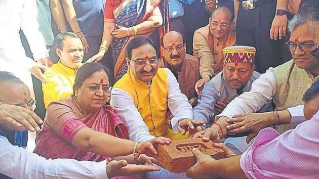 Governor Baby Rani Maurya, chief minister Shri Trivendra Singh Rawat and union Human Resource Development minister Ramesh Pokhriyal Nishank laid the foundation stone of the campus on Saturday.(HT Photo)