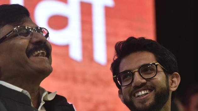 President of Yuva Sena, a youth wing of Shiv Sena Aaditya Thackeray and Shiv Sena Rajya Sabha MP Sanjay Raut share a light moment while addressing party workers in Worli, Mumbai. Raut is confident that Aaditya Thackeray’s entry will change the dynamics of Maharashtra’s politics. Maharashtra Aseembly polls are scheduled to be held on 21st October, 2019.(Kunal Patil/HT Photo)