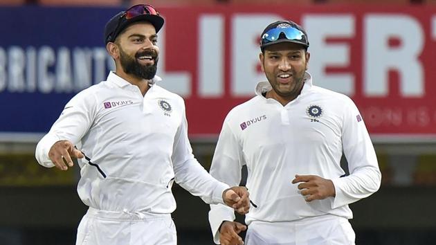 Indian captain Virat Kohli with teammate Rohit Sharma celebrates the dismissal of South Africa's Quinton de Kock. (PTI) Indian captain Virat Kohli with teammate Rohit Sharma celebrates the dismissal of South Africa's Quinton de Kock. (PTI)