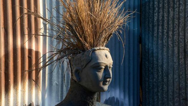 A semi-finished clay idol of the Hindu goddess Kali is kept in sunlight to dry in Siliguri, West Bengal. The worship of Hindu deity Kali takes place in the eastern Indian states along with ‘Diwali’, the Festival of Lights, marking the victory of good over evil and commemorating the time when the Hindu god Lord Rama achieved victory over Ravana. (Diptendu Dutta / AFP)