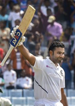 India's Rohit Sharma celebrates his double century during 2nd day of the 3rd cricket Test match. (PTI)