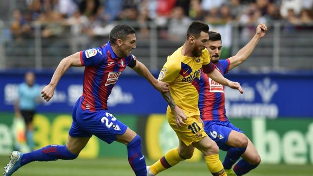 Barcelona's Lionel Messi, centre, tries to get between Eibar's Anaitz Arbilla and Sergio Alvarez during a Spanish La Liga soccer match between Eibar and FC Barcelona at the Ipurua stadium in Eibar, Spain, Saturday Oct. 19, 2019. (AP) Barcelona's Lionel Messi, centre, tries to get between Eibar's Anaitz Arbilla and Sergio Alvarez during a Spanish La Liga soccer match between Eibar and FC Barcelona at the Ipurua stadium in Eibar, Spain, Saturday Oct. 19, 2019. (AP)