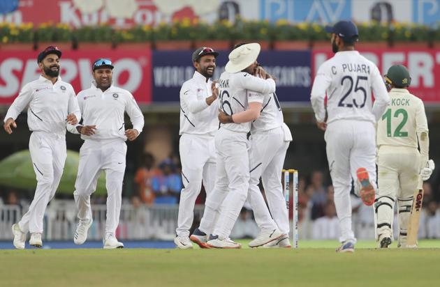 India's Umesh Yadav, third right, celebrates with teammates the dismissal of South Africa's. (AP)