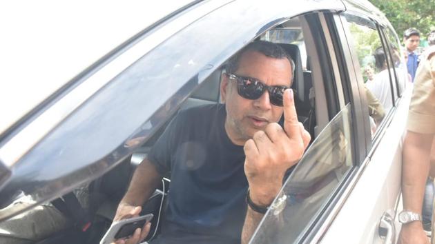 Paresh Rawal shows off his inked finger.