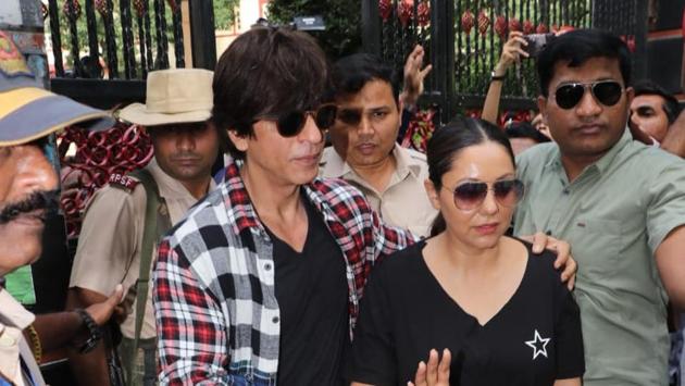 Shah Rukh Khan with wife Gauri Khan at a polling station.