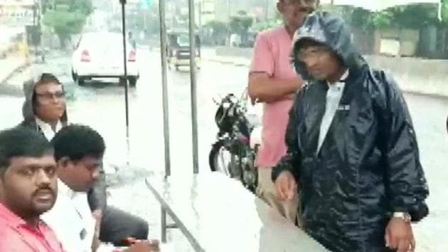 People brave rains in Latur to come and vote in the Maharashtra Assembly elections. (ANI) People brave rains in Latur to come and vote in the Maharashtra Assembly elections. (ANI)