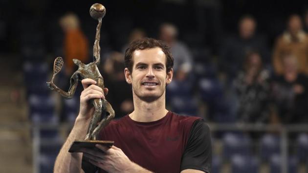 Andy Murray of Britain poses with the trophy after winning the European Open final.(AP)