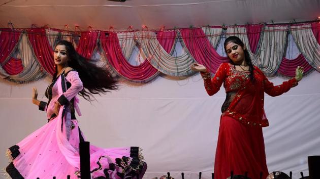 (The girls earn between <span class='webrupee'>₹</span>500 to <span class='webrupee'>₹</span>1,000 per day. They live in tents behind the stage for 10 days during Ramleela. “For the rest of the year, we dance at jaagrans and weddings. There are loans to be paid off, children to be fed. We set up tents near the venue. Isko party lagana kehte hain (We call it setting up a party),” says Aarti.)