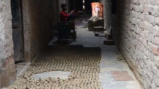 Harkishan, 63, who is called “pradhan” by everyone in the colony, blames shifting tastes and sensibilities towards traditional artisans. “Plastic, glass, and aluminium wares have replaced earthenware in homes. There is a declining appreciation for handmade and handcrafted items,” said Harkishan, who has won several awards and is also a “Shilp Guru”, an honour conferred by the Union government on a master craftsperson. (Vipin Kumar / HT Photo) 