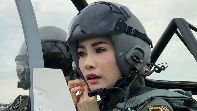 This undated photo posted Monday, August 26, 2019, on the Thailand Royal Office website shows Major General Sineenatra Wongvajirabhakdi, the royal noble consort of King Maha Vajiralongkorn, in an aircraft cockpit.(Photo: AP)