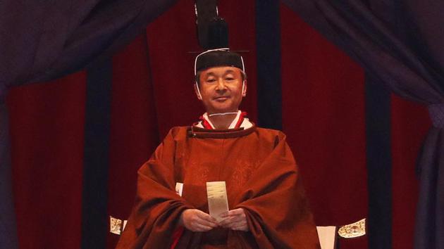 Japan's Emperor Naruhito attends a ceremony to proclaim his enthronement to the world, called Sokuirei-Seiden-no-gi, at the Imperial Palace in Tokyo, Japan, Tuesday, Oct. 22, 2019. (Issei Kato/Pool Photo via AP) (AP) Japan's Emperor Naruhito attends a ceremony to proclaim his enthronement to the world, called Sokuirei-Seiden-no-gi, at the Imperial Palace in Tokyo, Japan, Tuesday, Oct. 22, 2019. (Issei Kato/Pool Photo via AP) (AP)