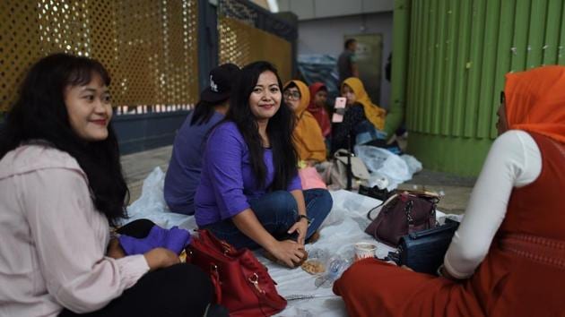 “I’m scared of trouble,” explained Marsanah (C), a helper who has been in Hong Kong for three years, who wanted to protest over Indah’s injury but feared falling foul of the authorities. Eni Lestari, chairwoman of the Network of Indonesian Migrant Workers, said many helpers felt the same way in a city where losing their job results in a sudden loss of their visa. (AFP)