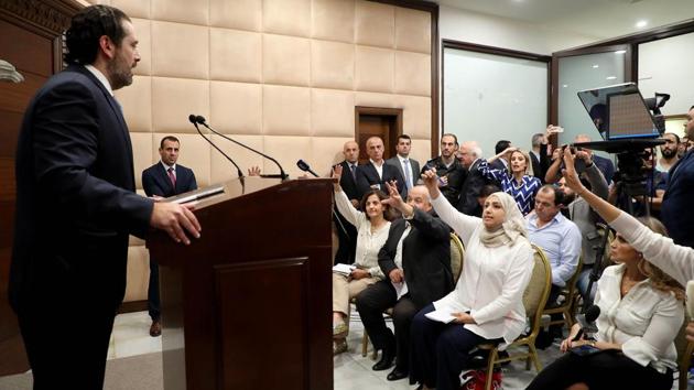Lebanon's Prime Minister Saad Hariri speaking to the press following a cabinet meeting at the presidential palace in Baabda, east of the capital Beirut. Following a nearly five-hour Cabinet meeting, Hariri announced a series of economic and financial reforms. “These decisions are not in exchange for anything. I am not going to ask you to stop protesting and stop expressing your anger. This is a decision that you take,” he said. (Dalati and Nohra / AFP)