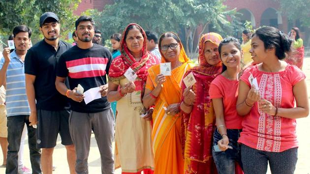 People stand in a queue to cast their vote, during the Haryana Assembly Election, in Gurugram. (ANI photo) People stand in a queue to cast their vote, during the Haryana Assembly Election, in Gurugram. (ANI photo)